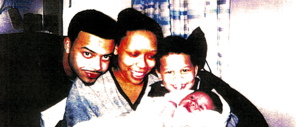 JJ with his family two weeks before the crime, showing his short hair