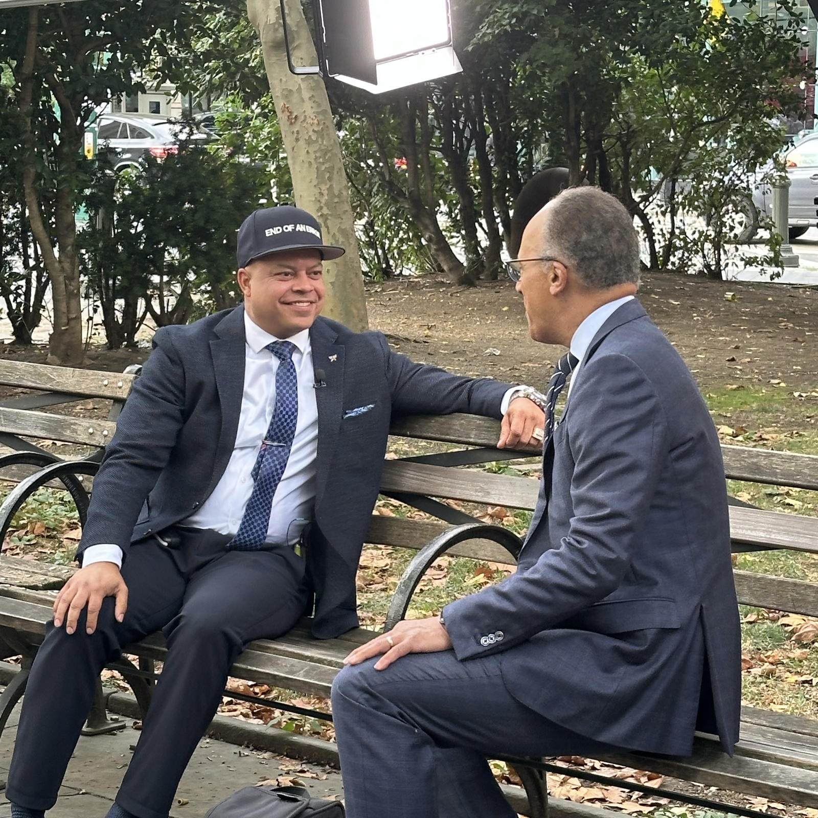 JJ Velazquez wearing an END OF AN ERROR hat while speaking with Lester Holt after his exoneration